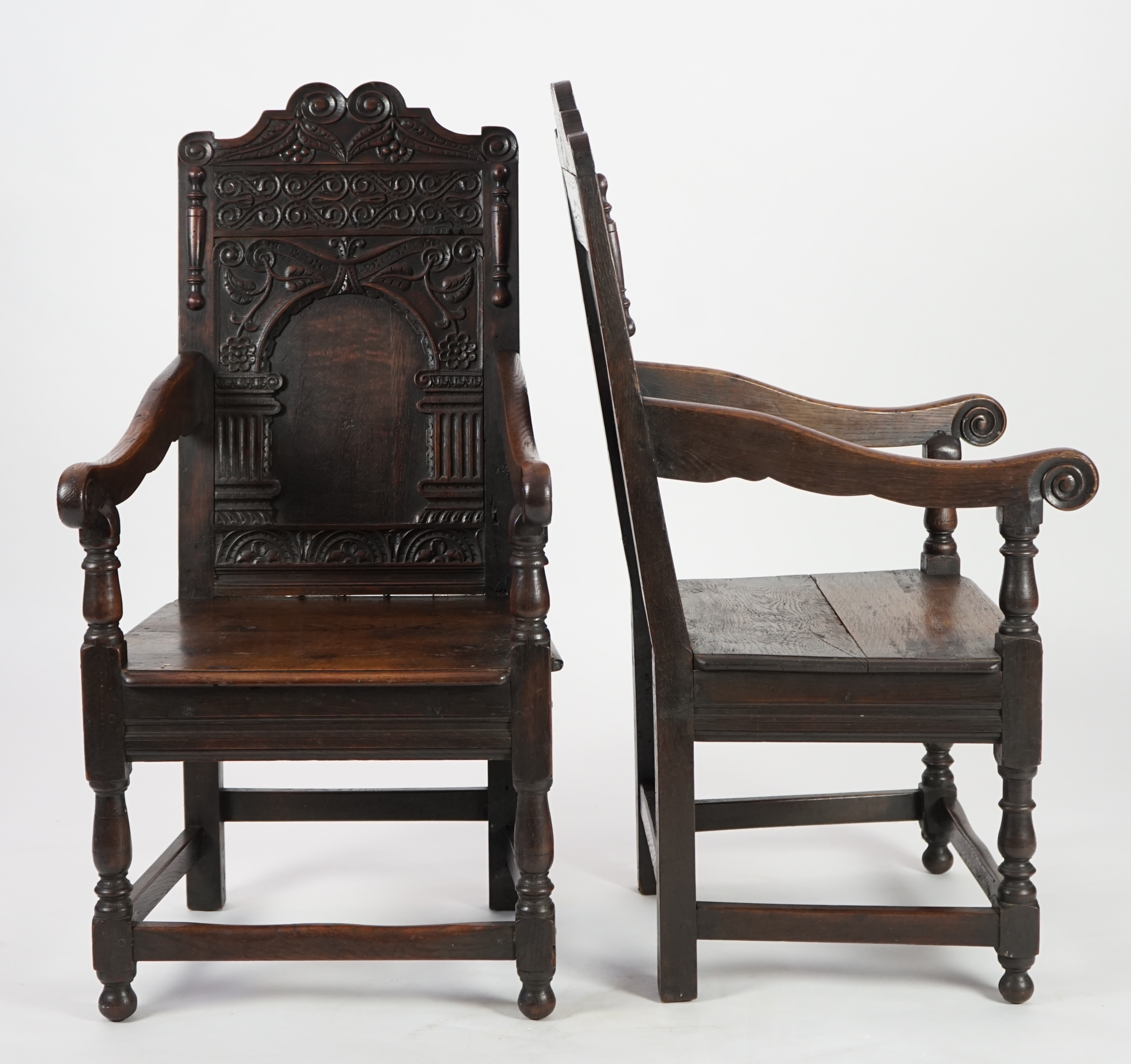 A pair of 17th century style oak Wainscot chairs